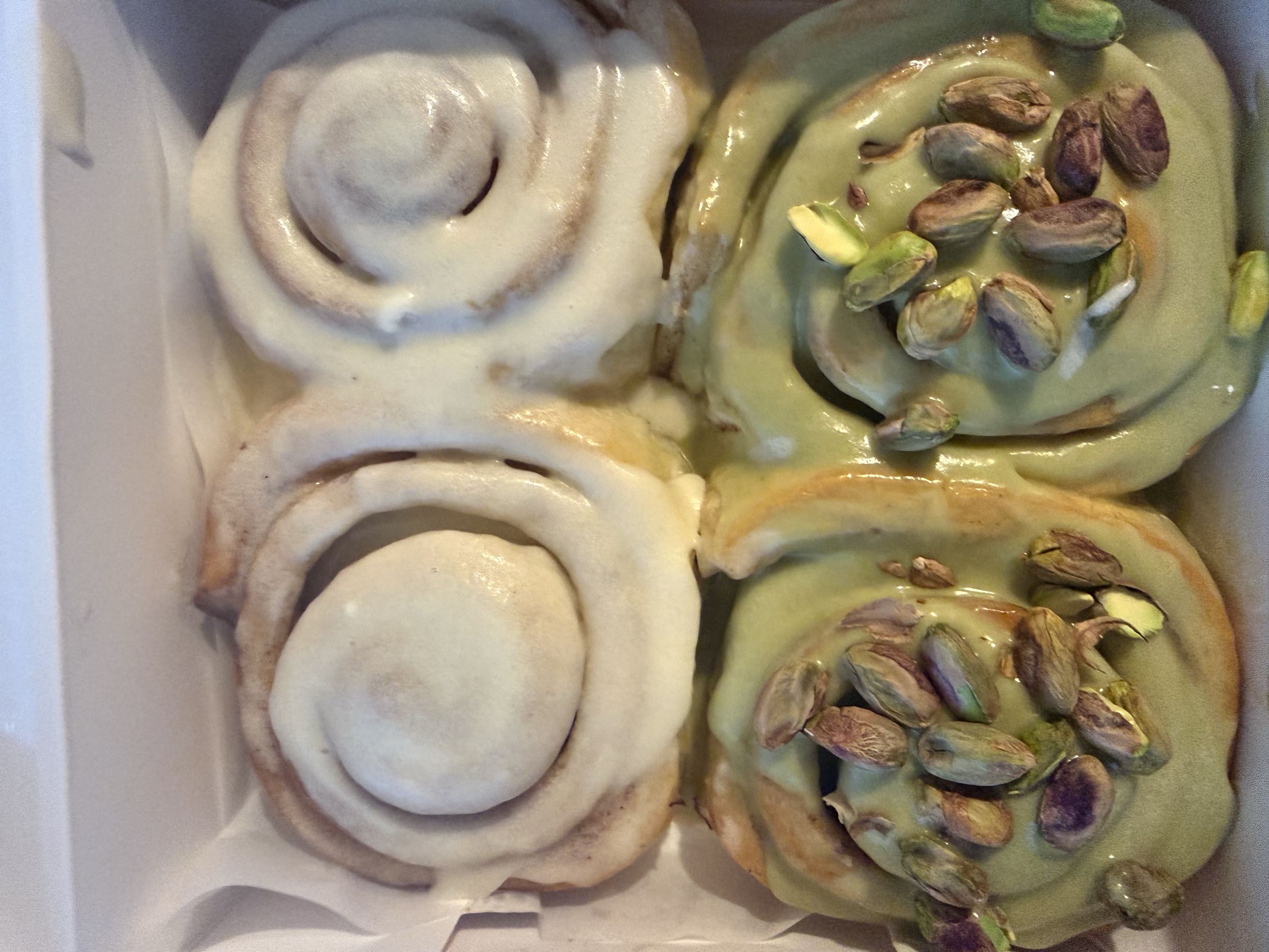 Boxed Glaze rolls with colorful toppings